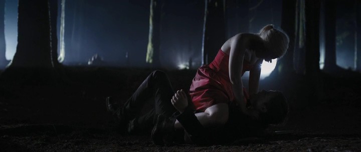 Girl pins down and strangles villain in Final Girl (2015)